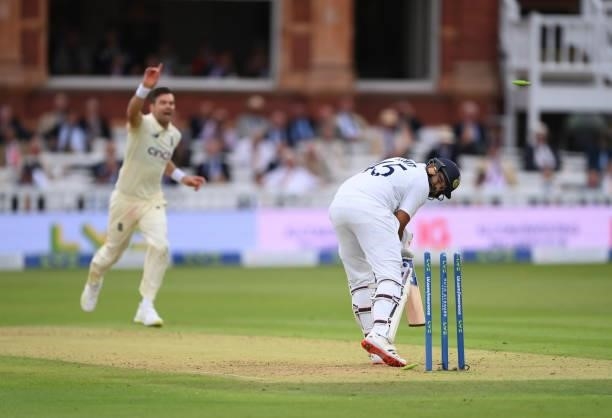 India batsman Rohit Sharma is bowled by James Anderson during day one of the Second Test Match between England and India at Lord's Cricket Ground on...