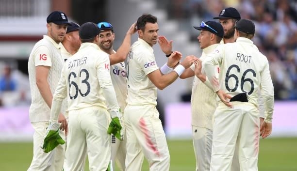England bowler James Anderson celebrates with team mates after dismissing Sharma during day one of the Second Test Match between England and India at...