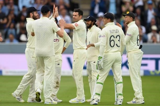 Jimmy Anderson of England celebrates with team mates after dismissing Rohit Sharma of India during the Second LV= Insurance Test Match: Day One...