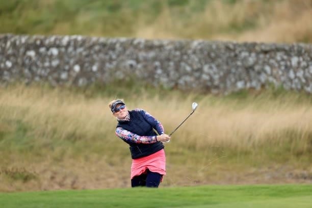 Kylie Henry of Scotland plays her second shot on the 17th hole during the first round of the Trust Golf Women's Scottish Open at Dumbarnie Links on...