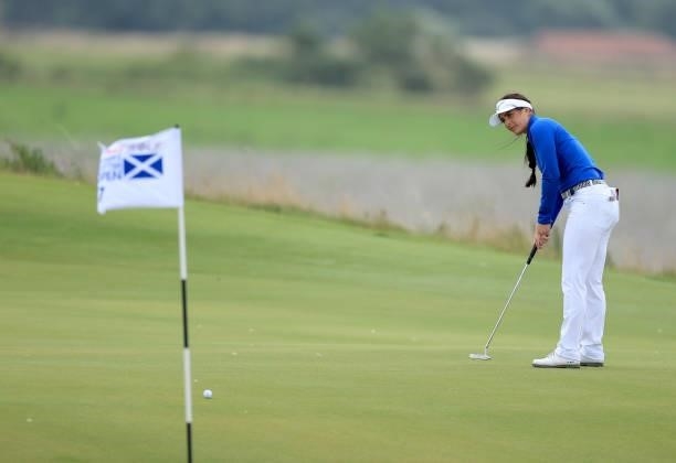 Kelsey Macdonald of Scotland hits a putt on the 17th hole during the first round of the Trust Golf Women's Scottish Open at Dumbarnie Links on August...