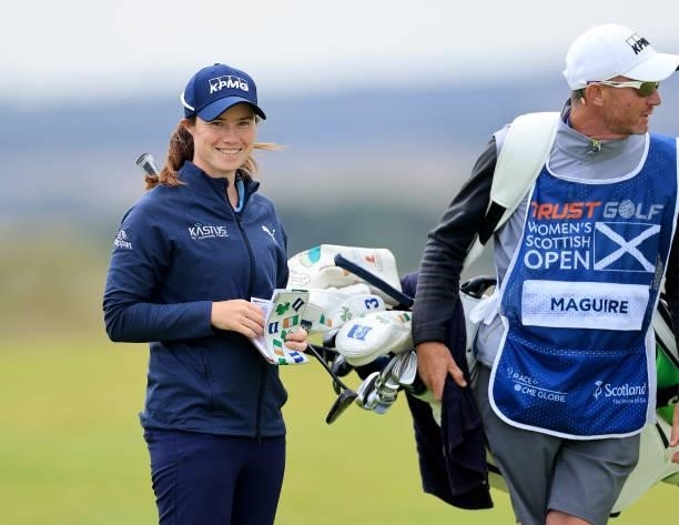 Leona Maguire of Ireland smiles after playing her second shot on the 12th hole during the first round of the Trust Golf Women's Scottish Open at...