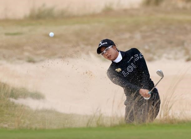 Patty Tavatanakit of Thailand plays her third shot on the 12th hole during the first round of the Trust Golf Women's Scottish Open at Dumbarnie Links...