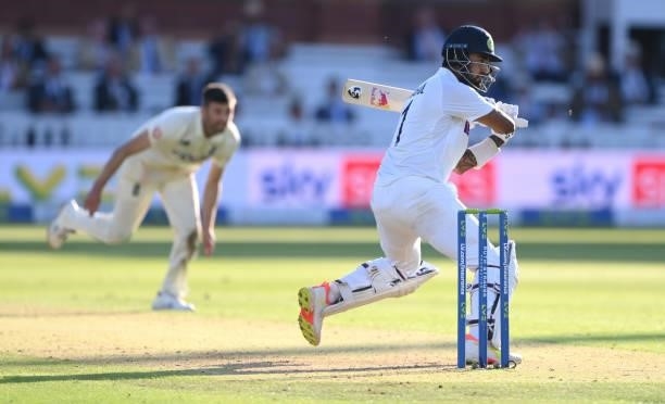 India batsman KL Rahul cuts Mark Wood to reach his century during day one of the Second Test Match between England and India at Lord's Cricket Ground...