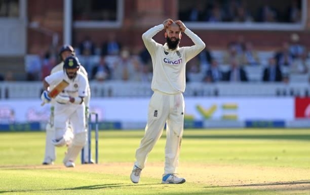 England bowler Moeen Ali reacst during day one of the Second Test Match between England and India at Lord's Cricket Ground on August 12, 2021 in...