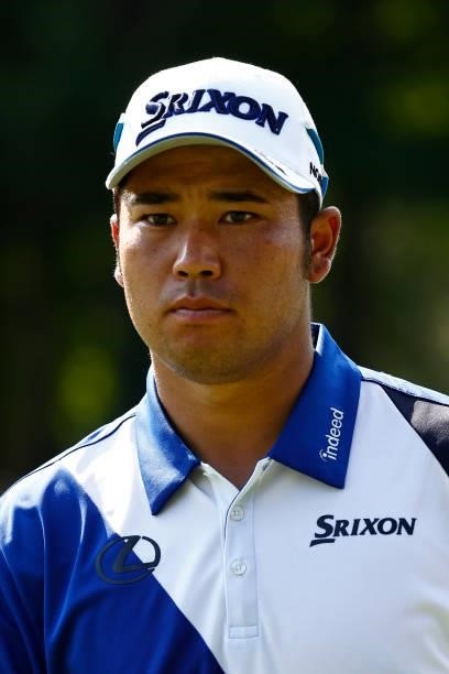 Hideki Matsuyama of Japan looks on from the 14th green during the first round of the Wyndham Championship at Sedgefield Country Club on August 12,...