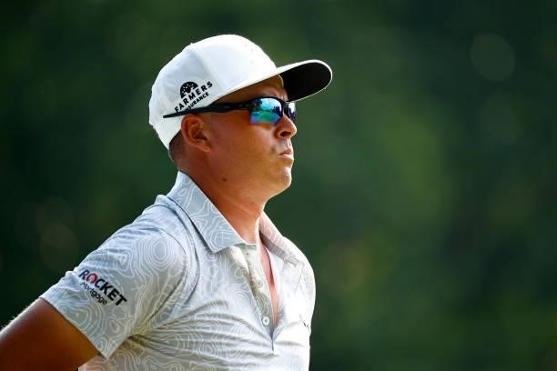 Rickie Fowler of the United States walks off of the 15th tee during the first round of the Wyndham Championship at Sedgefield Country Club on August...