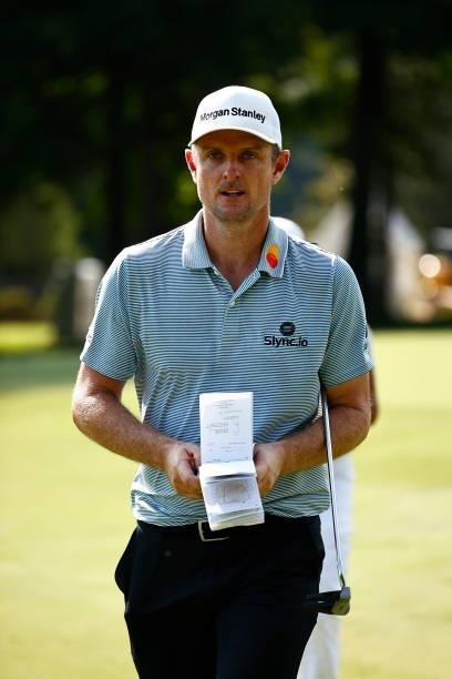 Justin Rose of England walks off the 14th green during the first round of the Wyndham Championship at Sedgefield Country Club on August 12, 2021 in...