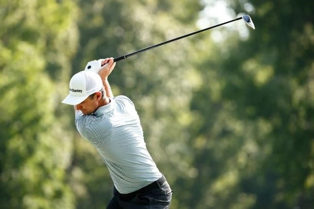 Justin Rose of England plays his shot from the 15th tee during the first round of the Wyndham Championship at Sedgefield Country Club on August 12,...
