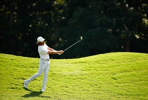 Tommy Fleetwood of England plays a second shot on the 14th hole during the first round of the Wyndham Championship at Sedgefield Country Club on...