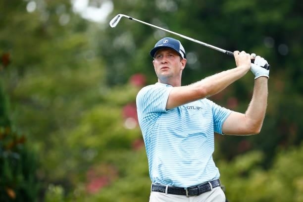 Hudson Swafford of the United States plays his shot from the 16th tee during the first round of the Wyndham Championship at Sedgefield Country Club...