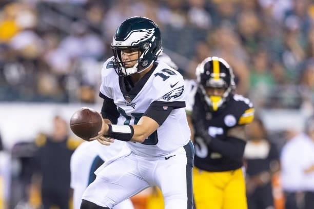 Nick Mullens of the Philadelphia Eagles hands the ball off against the Pittsburgh Steelers during the preseason game at Lincoln Financial Field on...