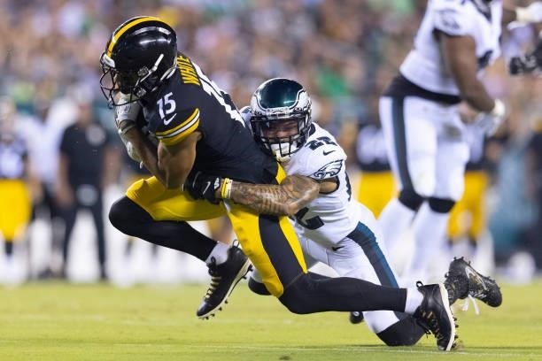 Marcus Epps of the Philadelphia Eagles tackles Cody White of the Pittsburgh Steelers during the preseason game at Lincoln Financial Field on August...