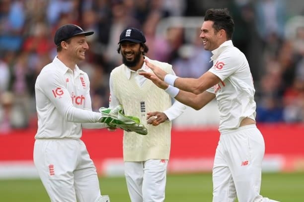 Jimmy Anderson of England celebrates with Jos Buttler and Haseeb Hameed after dismissing Ajinkya Rahane of India during the Second LV= Insurance Test...
