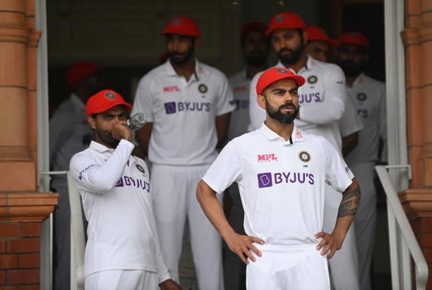 India captain Virat Kohli waits in his Red For Ruth cap to take to the field ahead of day two of the Second LV= Insurance Test Match between England...