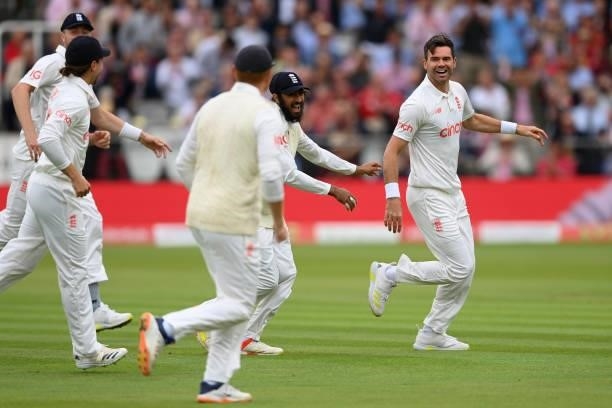 Jimmy Anderson of England is chased by team mates after dismissing Ajinkya Rahane of India during the Second LV= Insurance Test Match: Day Two...