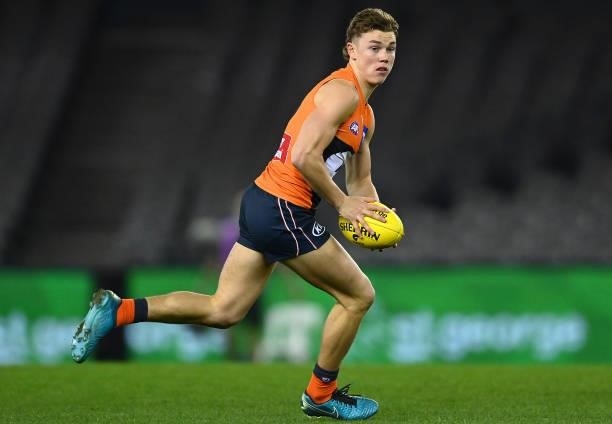Tanner Bruhn of the Giants kicks during the round 22 AFL match between Greater Western Sydney Giants and Richmond Tigers at Marvel Stadium on August...