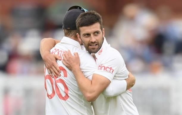Mark Wood of England celebrates with Joe Root after dismissing Rishabh Pant of India during the second day of the 2nd LV= Test match between England...