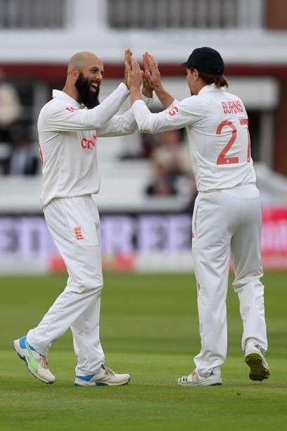 Moeen Ali of England celebrates with Rory Burns after dismissing Mohammed Shami of India during the Second LV= Insurance Test Match: Day Two between...