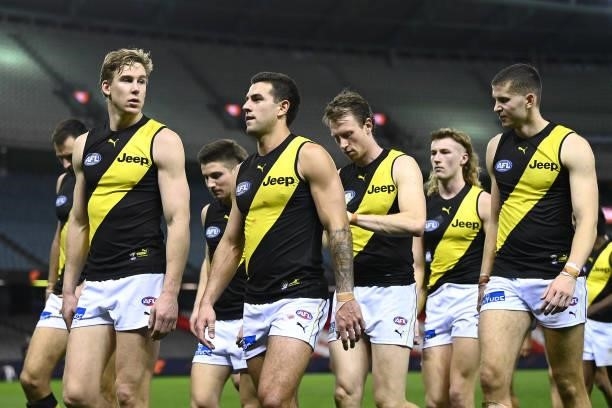 The Tigers look dejected after losing the round 22 AFL match between Greater Western Sydney Giants and Richmond Tigers at Marvel Stadium on August...