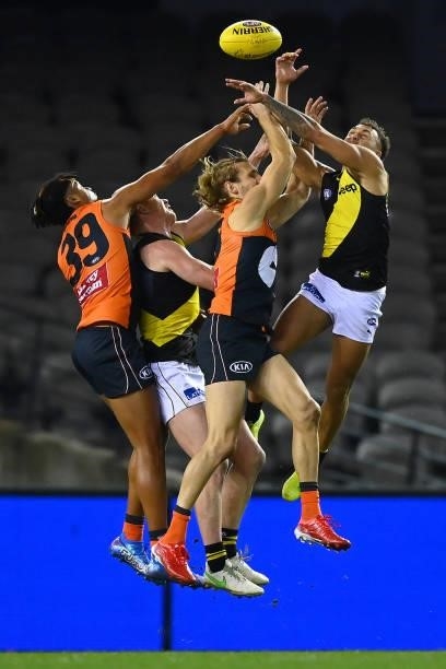 Shai Bolton of the Tigers attempts to mark during the round 22 AFL match between Greater Western Sydney Giants and Richmond Tigers at Marvel Stadium...