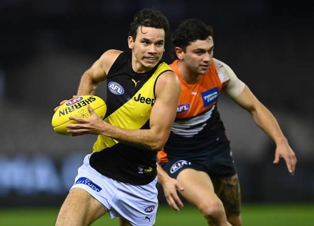 Daniel Rioli of the Tigers looks to pass the ball during the round 22 AFL match between Greater Western Sydney Giants and Richmond Tigers at Marvel...