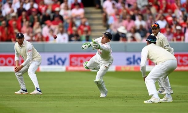 England wicketkeeper Jos Buttler dives for the ball during day two of the Second LV= Insurance Test Match between England and India at Lord's Cricket...