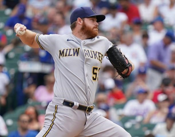 Brandon Woodruff of the Milwaukee Brewers throws a pitch against the Chicago Cubs at Wrigley Field on August 12, 2021 in Chicago, Illinois.