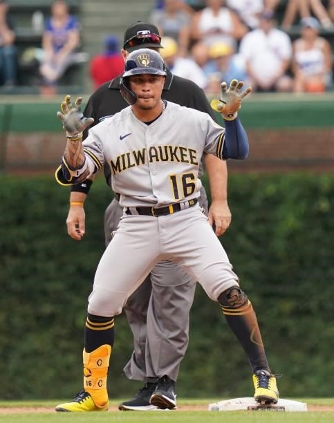 Kolten Wong of the Milwaukee Brewers reacts after his double during the fourth inning of a game against the Chicago Cubs at Wrigley Field on August...