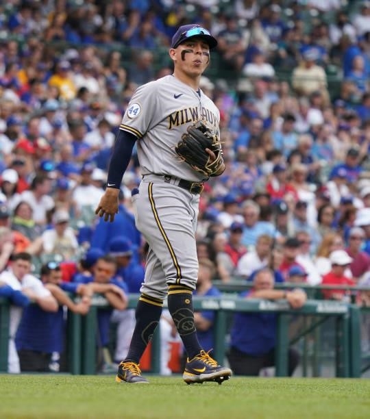 Luis Urias of the Milwaukee Brewers stands on the field during a game against the Chicago Cubs at Wrigley Field on August 12, 2021 in Chicago,...