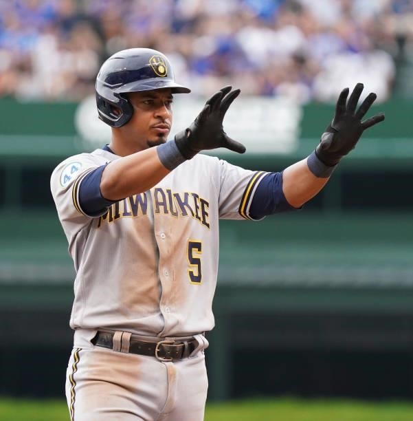 Eduardo Escobar of the Milwaukee Brewers reacts after a single during the fifth inning of a game against the Chicago Cubs at Wrigley Field on August...