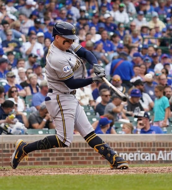 Luis Urias of the Milwaukee Brewers bats against the Chicago Cubs at Wrigley Field on August 12, 2021 in Chicago, Illinois.