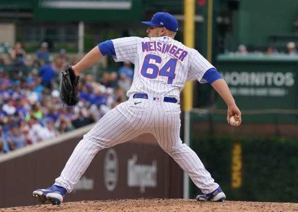 Ryan Meisinger of the Chicago Cubs throws a pitch against the Milwaukee Brewers at Wrigley Field on August 12, 2021 in Chicago, Illinois.