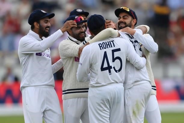 Mohammed Siraj of India celebrates with team mates KL Rahul, Ravindra Jadeja and Virat Kohli after dismissing Haseeb Hameed of England first ball...