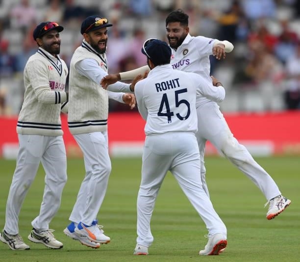 Mohammed Siraj of India celebrates with team mates Ravindra Jadeja, Virat Kohli and Rohit Sharma after dismissing Haseeb Hameed of England first ball...