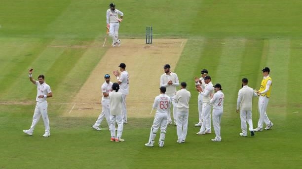 Jimmy Anderson of England acknowledges the applause from his team mates and the spectators after taking another 5 wicket haul during the Second LV=...