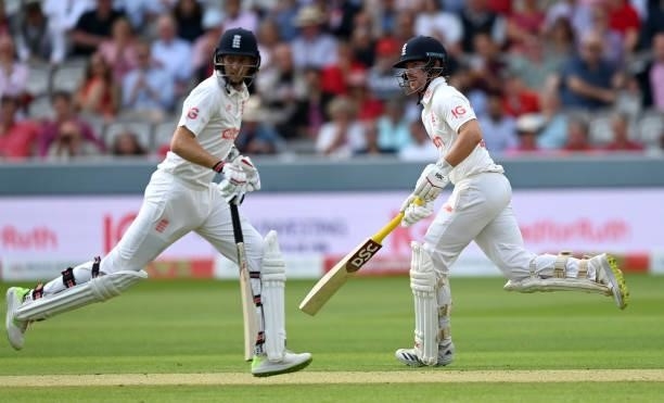 Rory Burns and Joe Root of England run between the wickets during day two of the Second LV= Insurance Test Match between England and India at Lord's...