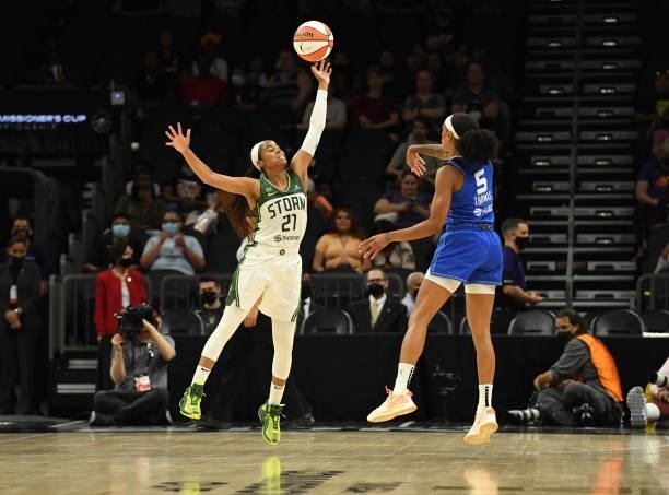 Jordin Canada of the Seattle Storm tips a pass from Jasmine Thomas of the Connecticut Sun during the 2021 Commissioner's Cup Championship Game at...
