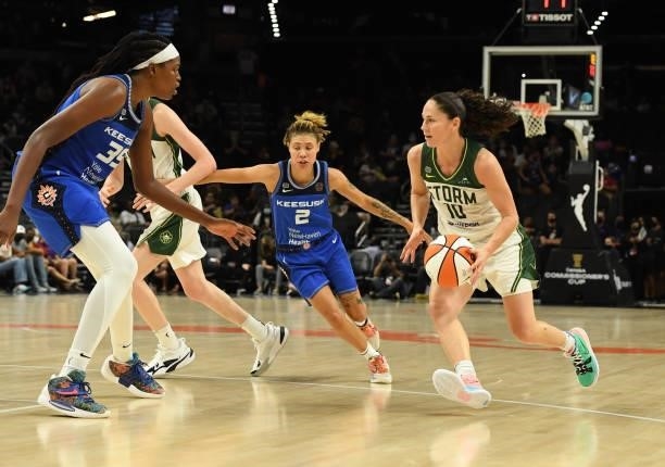 Sue Bird of the Seattle Storm drives to the basket while being defended by Jonquel Jones of the Connecticut Sun during the 2021 Commissioner's Cup...