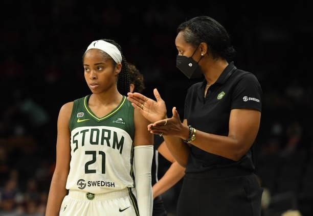 Head coach Noelle Quinn of the Seattle Storm talks with Jordin Canada during a stop in play against the Connecticut Sun during the second half of the...
