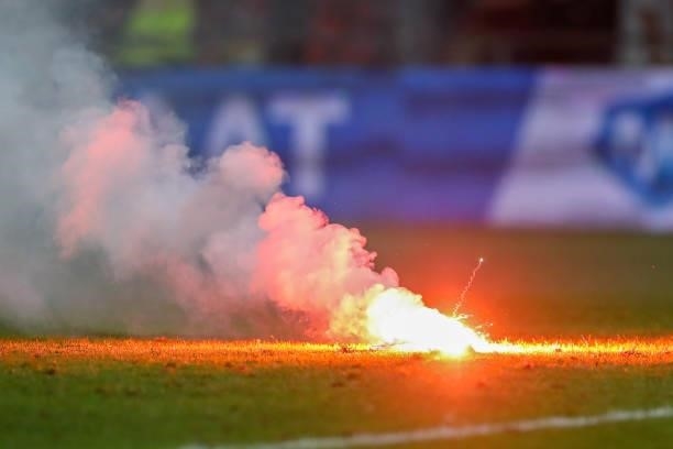 A Firework falls on the field during the Dutch Eredivisie match between Go Ahead Eagles and SC Heerenveen at De Adelaarshorst on August 14, 2021 in...
