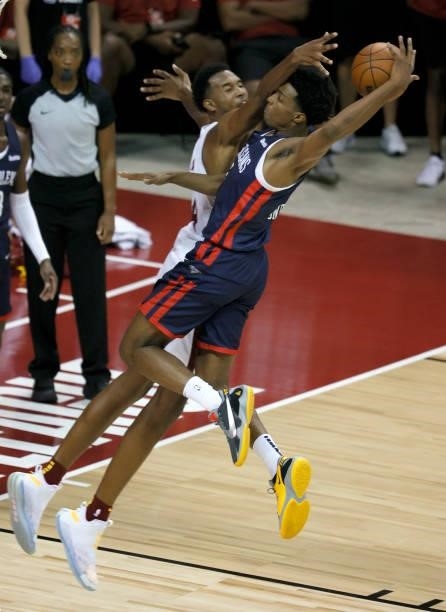 Evan Mobley of the Cleveland Cavaliers fouls Herbert Jones of the New Orleans Pelicans during the 2021 NBA Summer League at the Thomas & Mack Center...