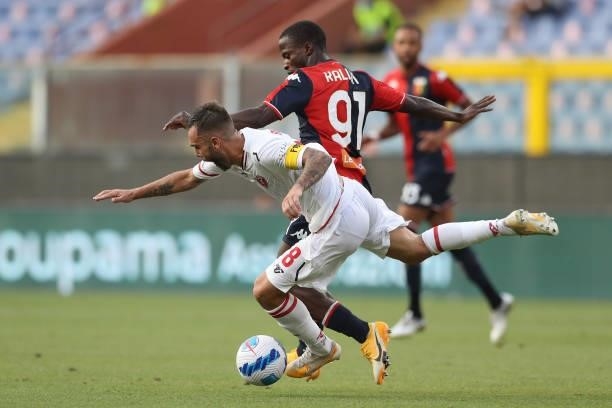 Yayah Kallon of Genoa CFC clashes with Salvatore Burrai of AC Perugia Calcio during the Coppa Italia match between Genoa CFC and AC Perugia Calcio at...