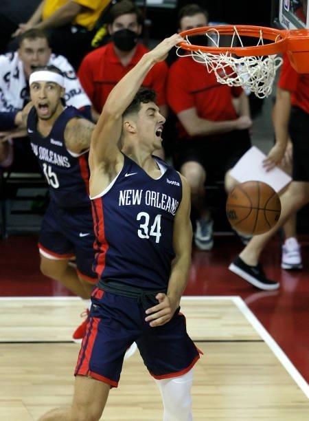 Jose Alvarado of the New Orleans Pelicans reacts as his teammate Daulton Hommes dunks against the Cleveland Cavaliers during the 2021 NBA Summer...