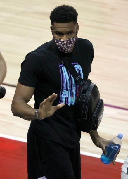 Giannis Antetokounmpo of the Milwaukee Bucks waves as he leaves a game between the Bucks and the Minnesota Timberwolves during the 2021 NBA Summer...