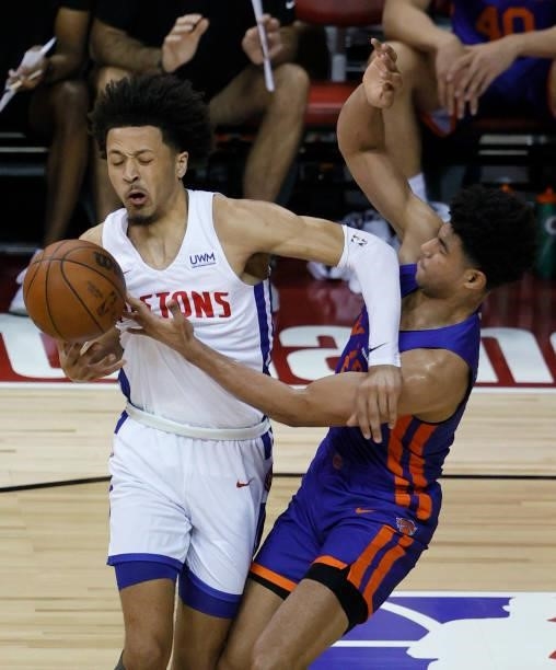 Cade Cunningham of the Detroit Pistons loses the ball under pressure from Quentin Grimes of the New York Knicks during the 2021 NBA Summer League at...