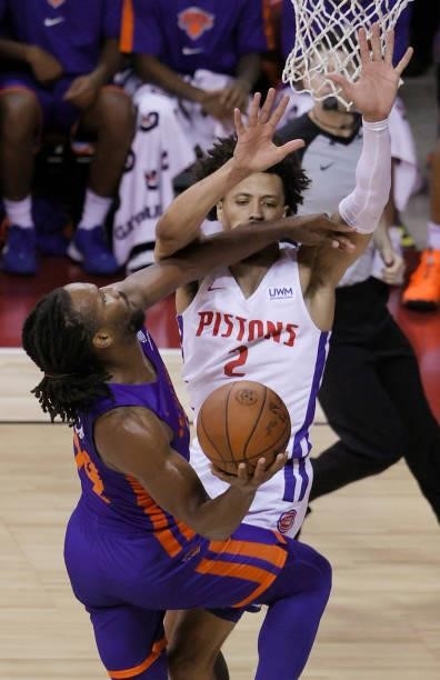 Wayne Selden of the New York Knicks is fouled by Cade Cunningham of the Detroit Pistons during the 2021 NBA Summer League at the Thomas & Mack Center...