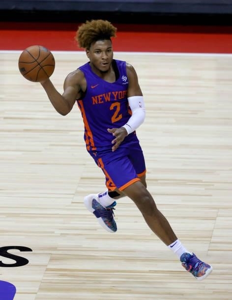 Miles McBride of the New York Knicks passes against the Detroit Pistons during the 2021 NBA Summer League at the Thomas & Mack Center on August 13,...