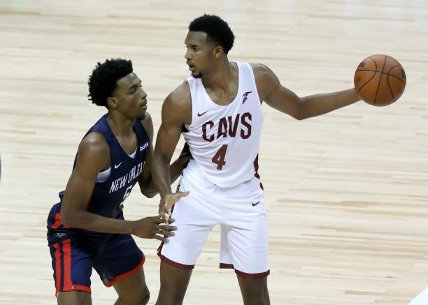 Evan Mobley of the Cleveland Cavaliers is guarded by Herbert Jones of the New Orleans Pelicans during the 2021 NBA Summer League at the Thomas & Mack...