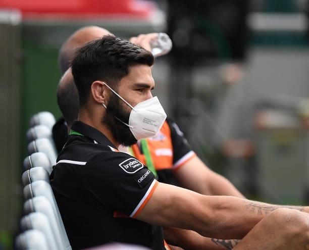 James Tamou of the Tigers looks on before the start of the round 22 NRL match between the North Queensland Cowboys and the Wests Tigers at QCB...